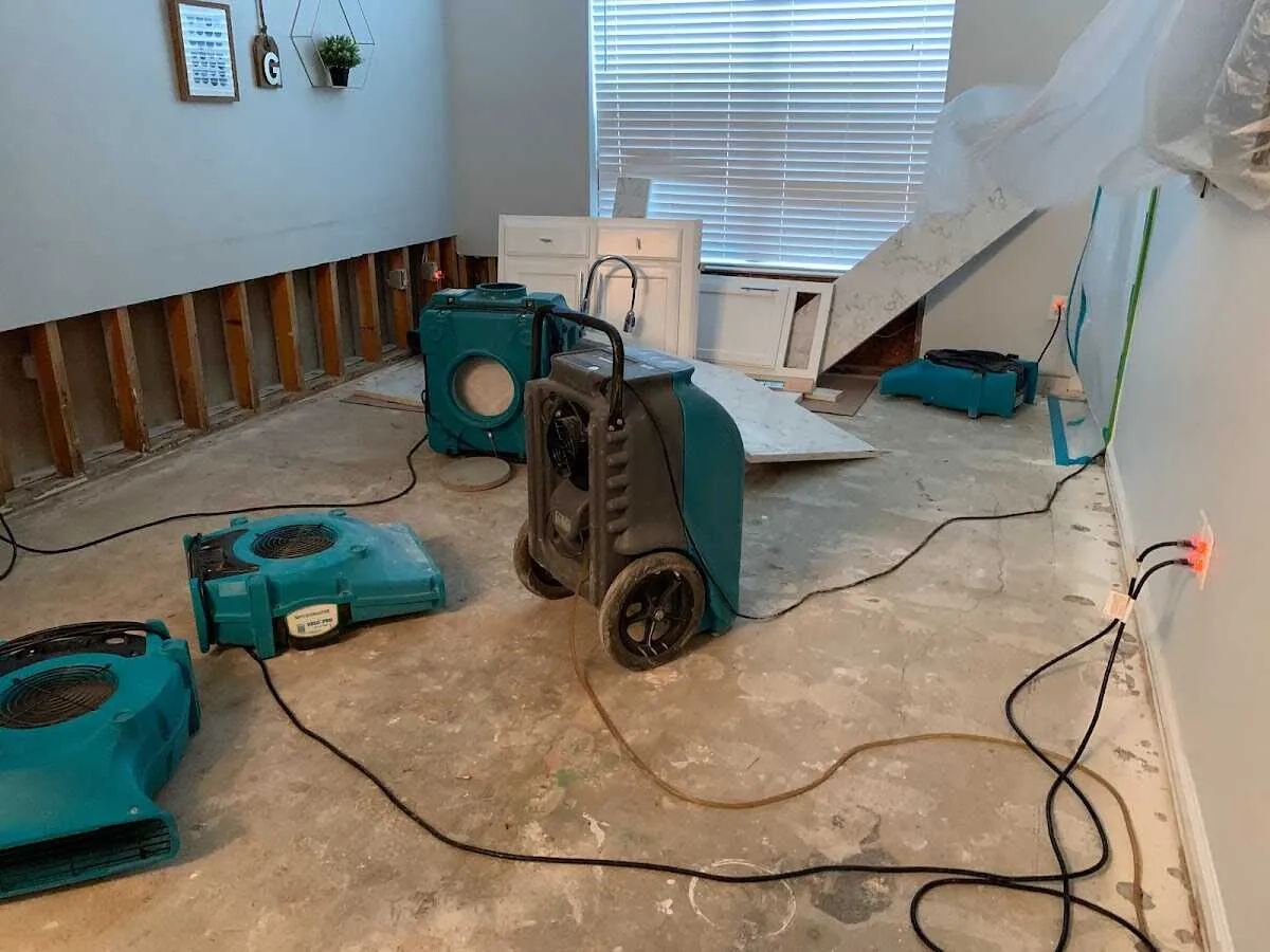 Dehumidifier in flood-cut room for Water Damage Restoration in Winters
